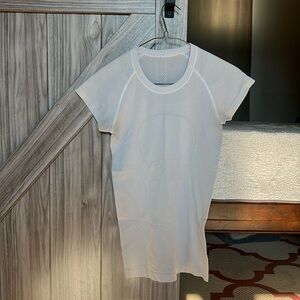 Swiftly Tech Short-Sleeve Shirt
Hip Length